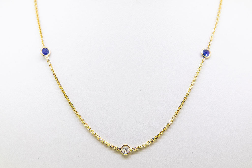 14 K YG Diamond and Sapphire by the yard chain Jewelry Store downtown boston