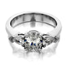 three stone with oval center and pear sides engagement ring from GQJ Boston