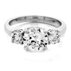 Three stone with round stones basket style engagement ring from GQJ Boston