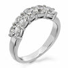GoldQuest Jewelers in Boston shared prong set curved wedding band