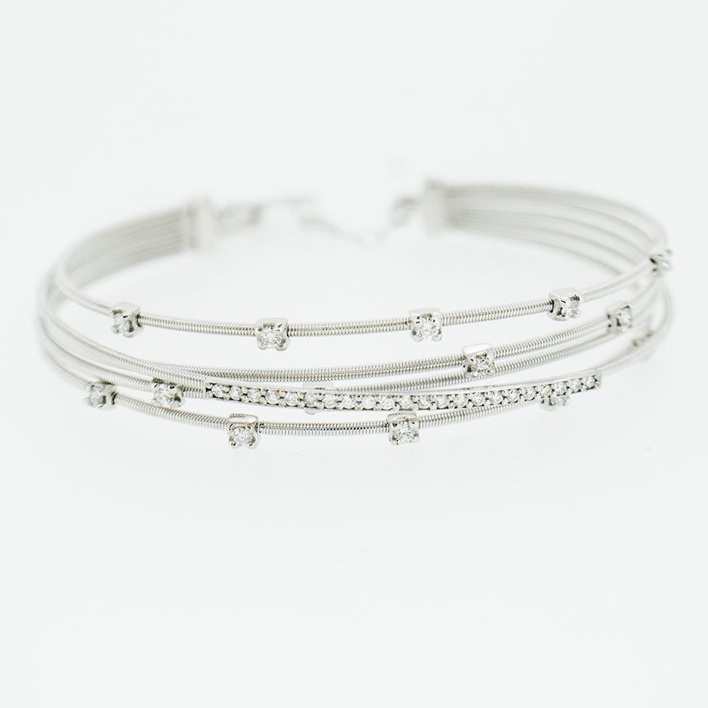 Diamond interlaced bracelet from GoldQuestJewelers jewelry studio in Boston MA