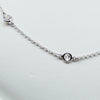 white gold with diamond dot station necklace from GoldQuestJewelers jewelry store in Boston MA