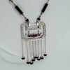 White gold handmade necklace with diamonds and rubies from GoldQuestJewelers near Boston MA