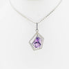 White gold handmade necklace with diamonds and precious stone center from GoldQuestJewelers near Boston MA