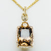 Yellow gold double chain with diamond and precious gemstone center from GoldQuestJewelers jewelry store in Boston MA